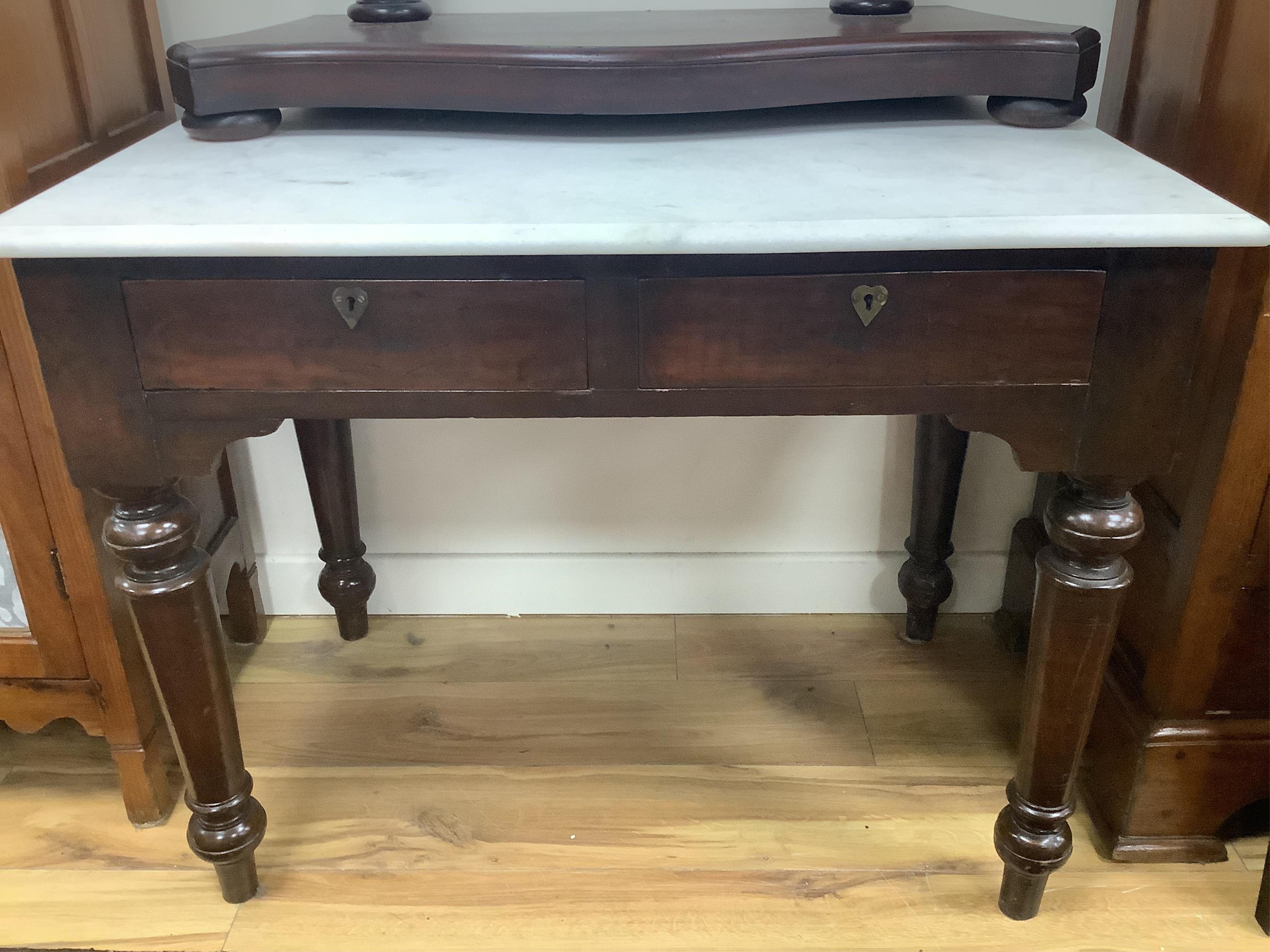 An Anglo Indian teak marbled topped dressing table, width 91cm, depth 58cm, height 164cm and a mahogany mirror. Condition - good